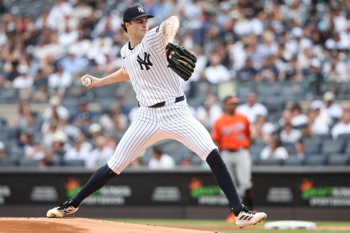 Sep 27, 2025; Bronx, New York, USA;  New York Yankees starting pitcher Cam Schlittler (31) pitches in the first inning against the Baltimore Orioles at Yankee Stadium. Mandatory Credit: Wendell Cruz-Imagn Images