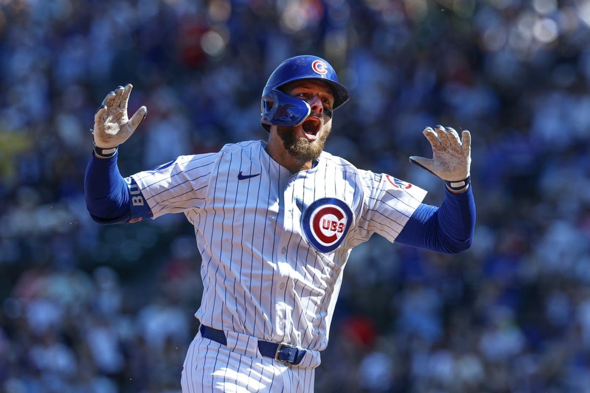 Sep 27, 2025; Chicago, Illinois, USA; Chicago Cubs first baseman Michael Busch (29) rounds the bases after hitting a solo home run against the St. Louis Cardinals during the first inning at Wrigley Field. Mandatory Credit: Kamil Krzaczynski-Imagn Images