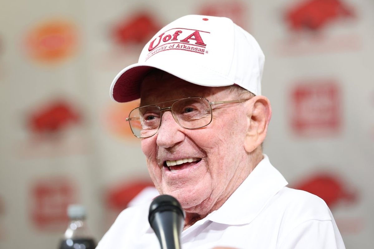 Sep 27, 2025; Fayetteville, Arkansas, USA; Former Notre Dame Fighting and Arkansas Razorbacks head coach Lou Holtz holds a press conference prior to the game at Donald W. Reynolds Razorback Stadium. Mandatory Credit: Nelson Chenault-Imagn Images