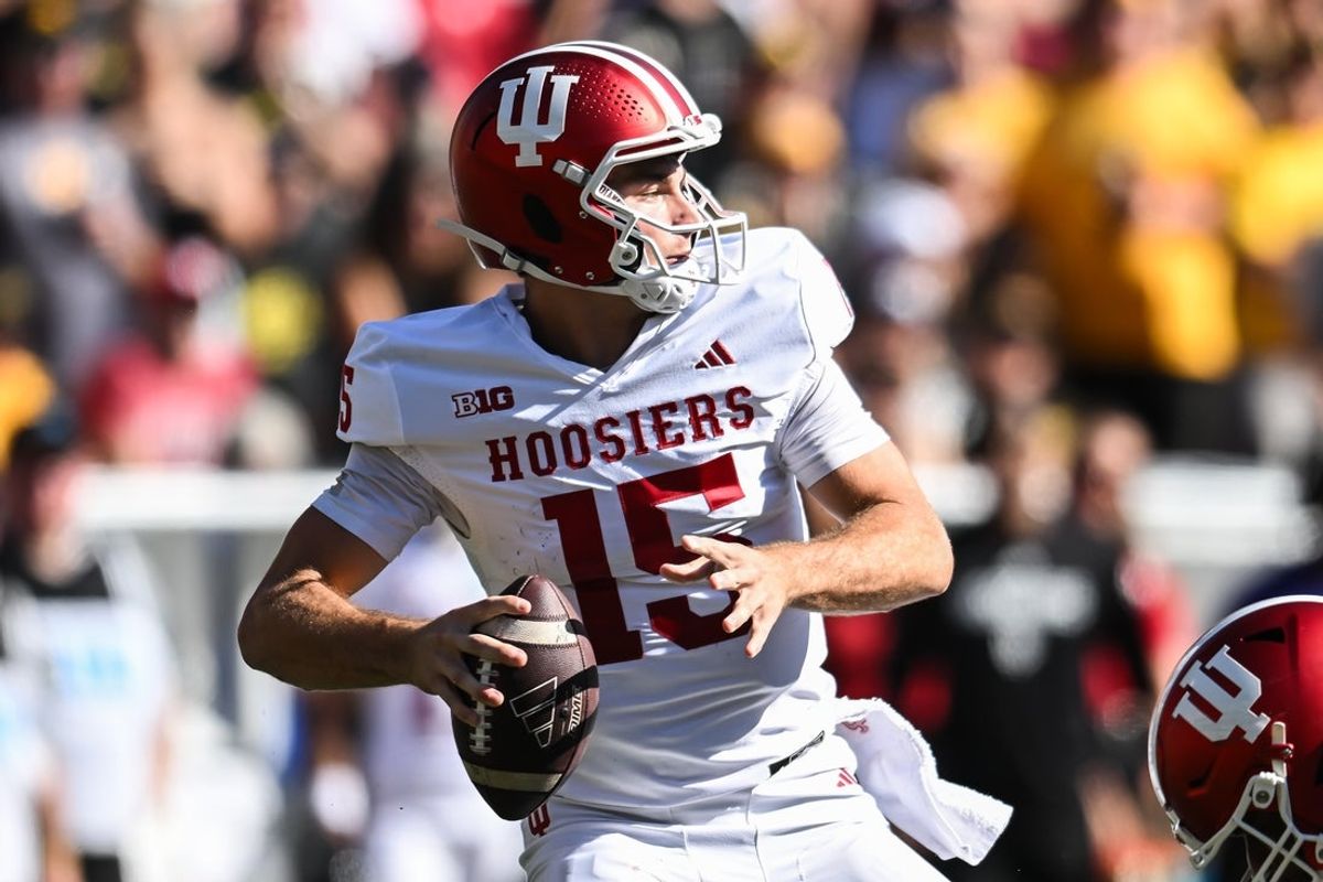 Sep 27, 2025; Iowa City, Iowa, USA; Indiana Hoosiers quarterback Fernando Mendoza (15) throws a pass against the Iowa Hawkeyes during the second quarter at Kinnick Stadium. Mandatory Credit: Jeffrey Becker-Imagn Images