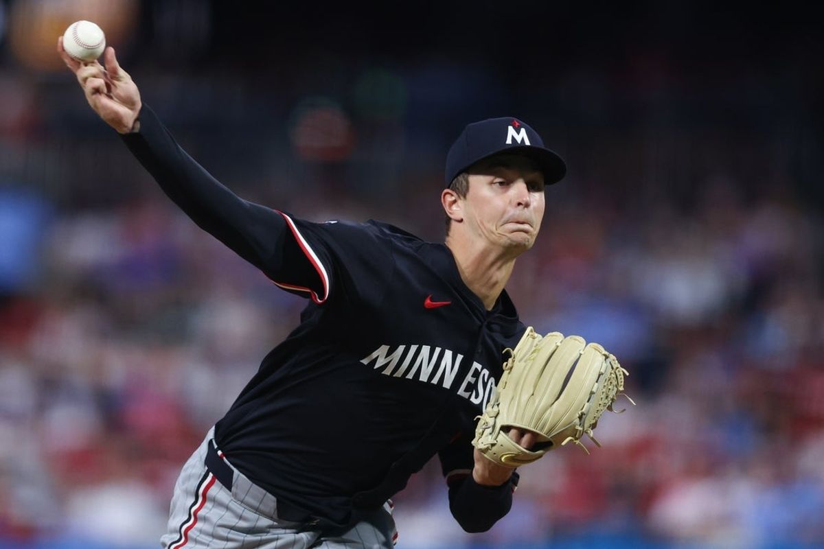 Sep 27, 2025; Philadelphia, Pennsylvania, USA; Minnesota Twins pitcher Mick Abel (20) throws a pitch during the second inning against the Philadelphia Phillies at Citizens Bank Park. Mandatory Credit: Bill Streicher-Imagn Images