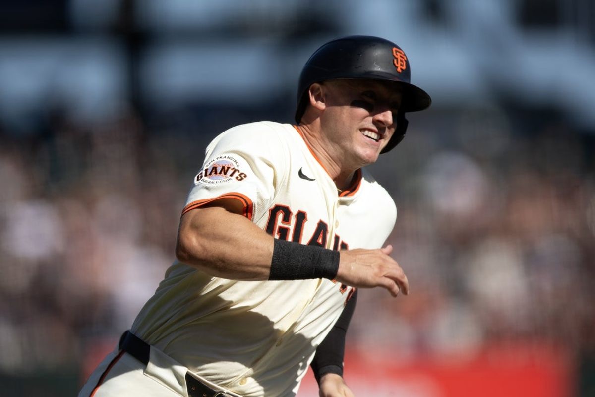 Sep 27, 2025; San Francisco, California, USA; San Francisco Giants catcher Andrew Knizner scores from first base on a double by Rafael Devers during the eighth inning against the Colorado Rockies at Oracle Park. Mandatory Credit: D. Ross Cameron-Imagn Images