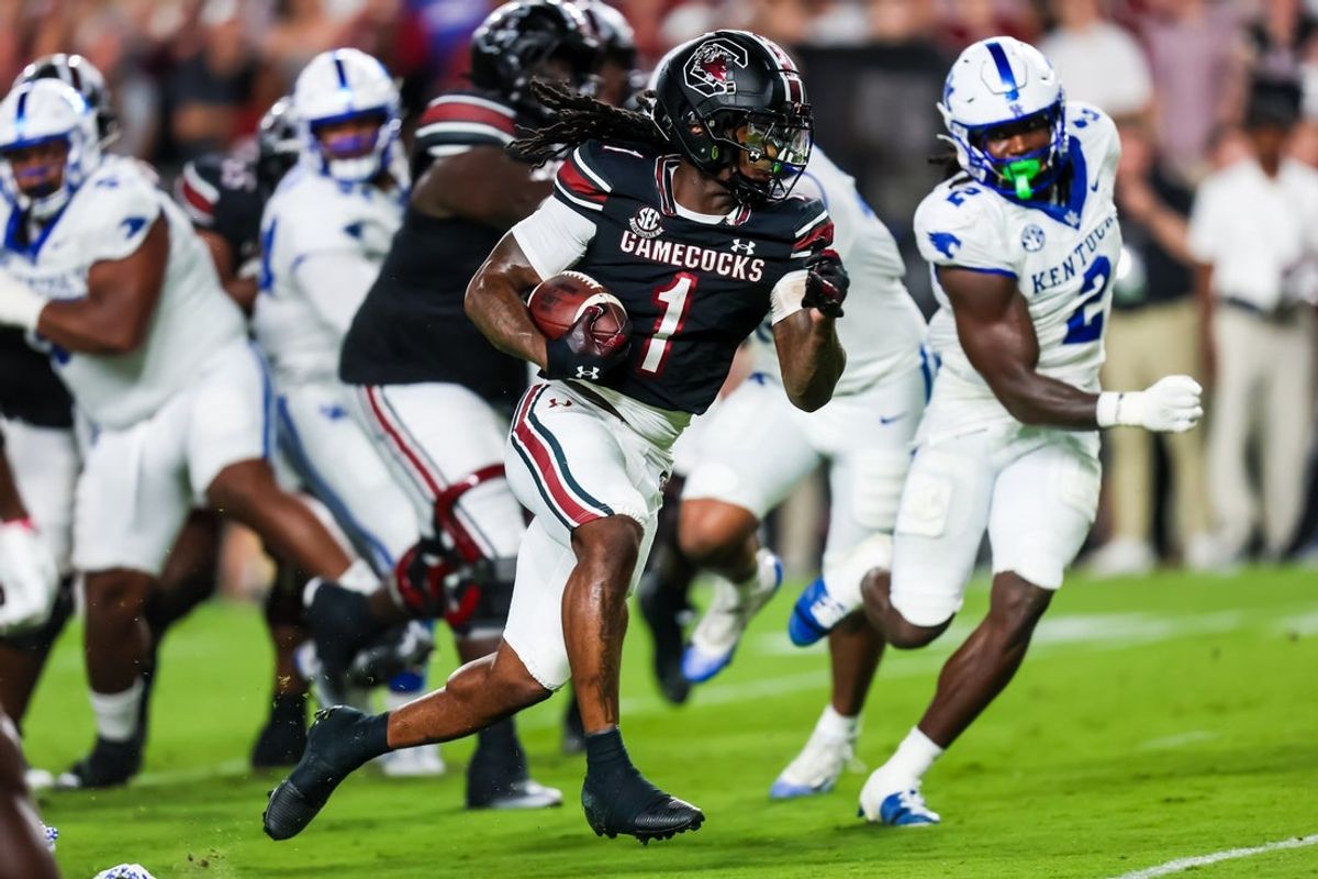 Sep 27, 2025; Columbia, South Carolina, USA; South Carolina Gamecocks running back Rahsul Faison (1) rushes for a touchdown against the Kentucky Wildcats in the first quarter at Williams-Brice Stadium. Mandatory Credit: Jeff Blake-Imagn Images