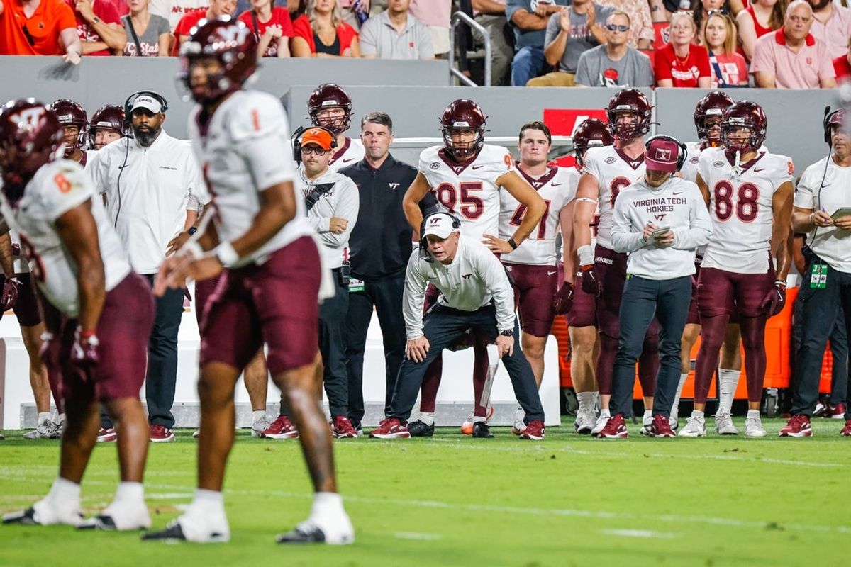 Sep 27, 2025; Raleigh, North Carolina, USA; Virginia Tech Hokies interim head coach Philip Montgomery shouts to his team during the first half of the game against North Carolina State Wolfpack at Carter-Finley Stadium. Mandatory Credit: Jaylynn Nash-Imagn Images