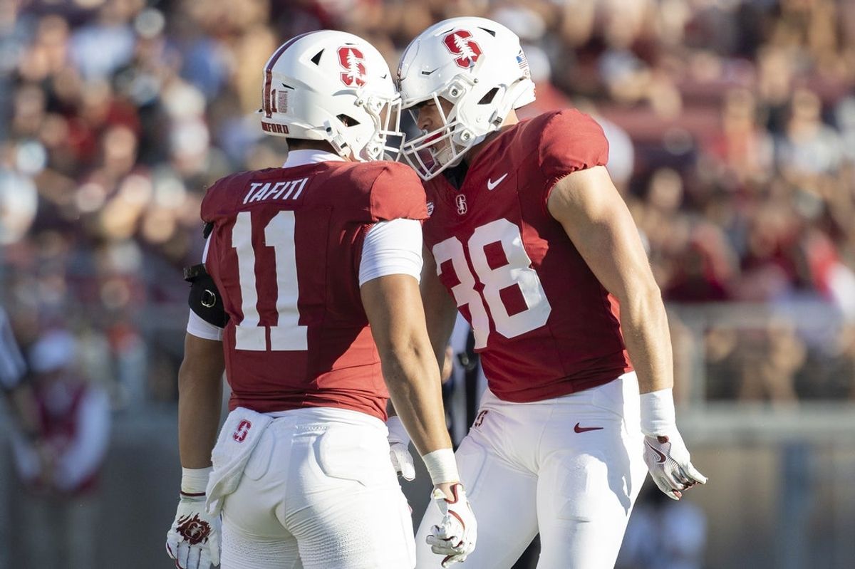 Sep 27, 2025; Stanford, California, USA;  Stanford Cardinal linebacker Zach Johnson (38) celebrates with linebacker Tevarua Tafiti (11) during the second quarter against the San Jose State Spartans at Stanford Stadium. Mandatory Credit: Stan Szeto-Imagn Images