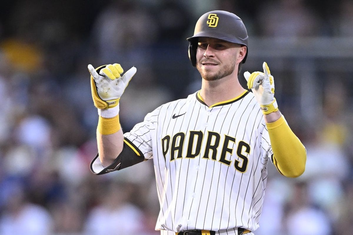 Sep 27, 2025; San Diego, California, USA; San Diego Padres first baseman Ryan O'Hearn (32) gestures after hitting a double during the second inning against the Arizona Diamondbacks at Petco Park. Mandatory Credit: Denis Poroy-Imagn Images