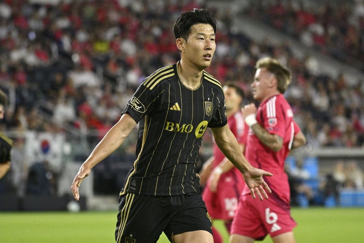 Sep 27, 2025; St. Louis, Missouri, USA; LAFC forward Son Heung-Min (7) celebrates after scoring a goal against St. Louis CITY SC in the first half at Energizer Park. Mandatory Credit: Joe Puetz-Imagn Images