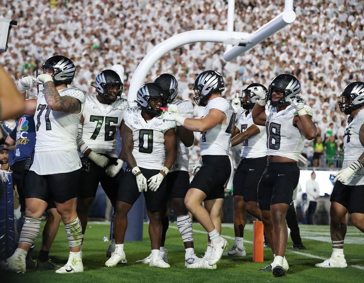 Sep 27, 2025; University Park, Pennsylvania, USA; Oregon Ducks running back Jordon Davison (0) reacts after scoring a touchdown against the Penn State Nittany Lions at Beaver Stadium. Mandatory Credit: Matthew O'Haren-Imagn Images