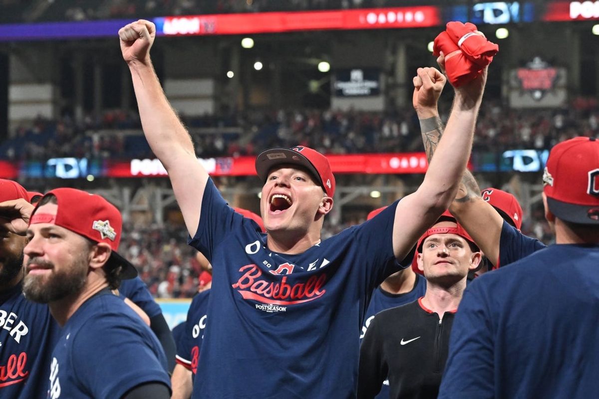 Sep 27, 2025; Cleveland, Ohio, USA; Cleveland Guardians starting pitcher Parker Messick (77) celebrates after the Guardians beat the Texas Rangers to secure a playoff berth at Progressive Field. Mandatory Credit: Ken Blaze-Imagn Images