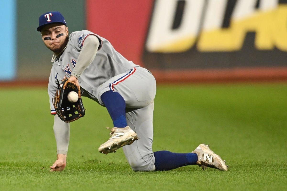 Sep 27, 2025; Cleveland, Ohio, USA; Texas Rangers left fielder Cody Freeman (39) fields a ball hit by Cleveland Guardians first baseman Kyle Manzardo (not pictured) during the ninth inning at Progressive Field. Mandatory Credit: Ken Blaze-Imagn Images