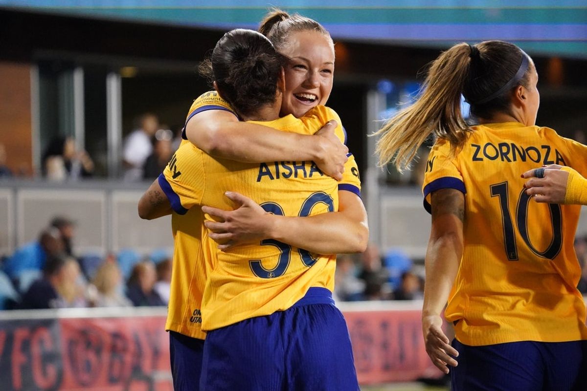 Sep 27, 2025; San Jose, California, USA;  Utah Royals forward Aisha Solorzano (30) celebrates with Utah Royals midfielder Janni Thomsen (7) after scoring a goal in the first half against Bay FC at PayPal Park. Mandatory Credit: David Gonzales-Imagn Images