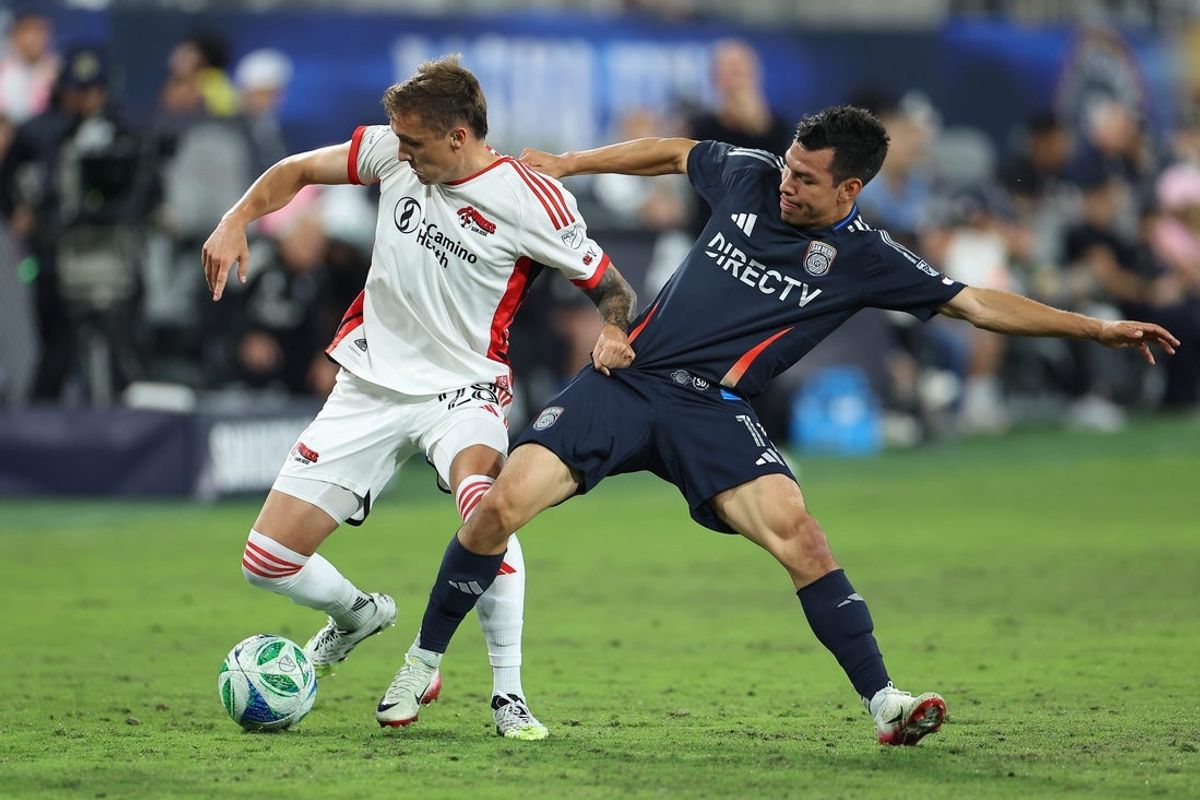 Sep 27, 2025; San Diego, California, USA; San Jose Earthquakes midfielder Benjamin Kikanovic (28) controls the ball against San Diego FC forward Hirving Lozano (11) during the first half at Snapdragon Stadium. Mandatory Credit: Abe Arredondo-Imagn Images
