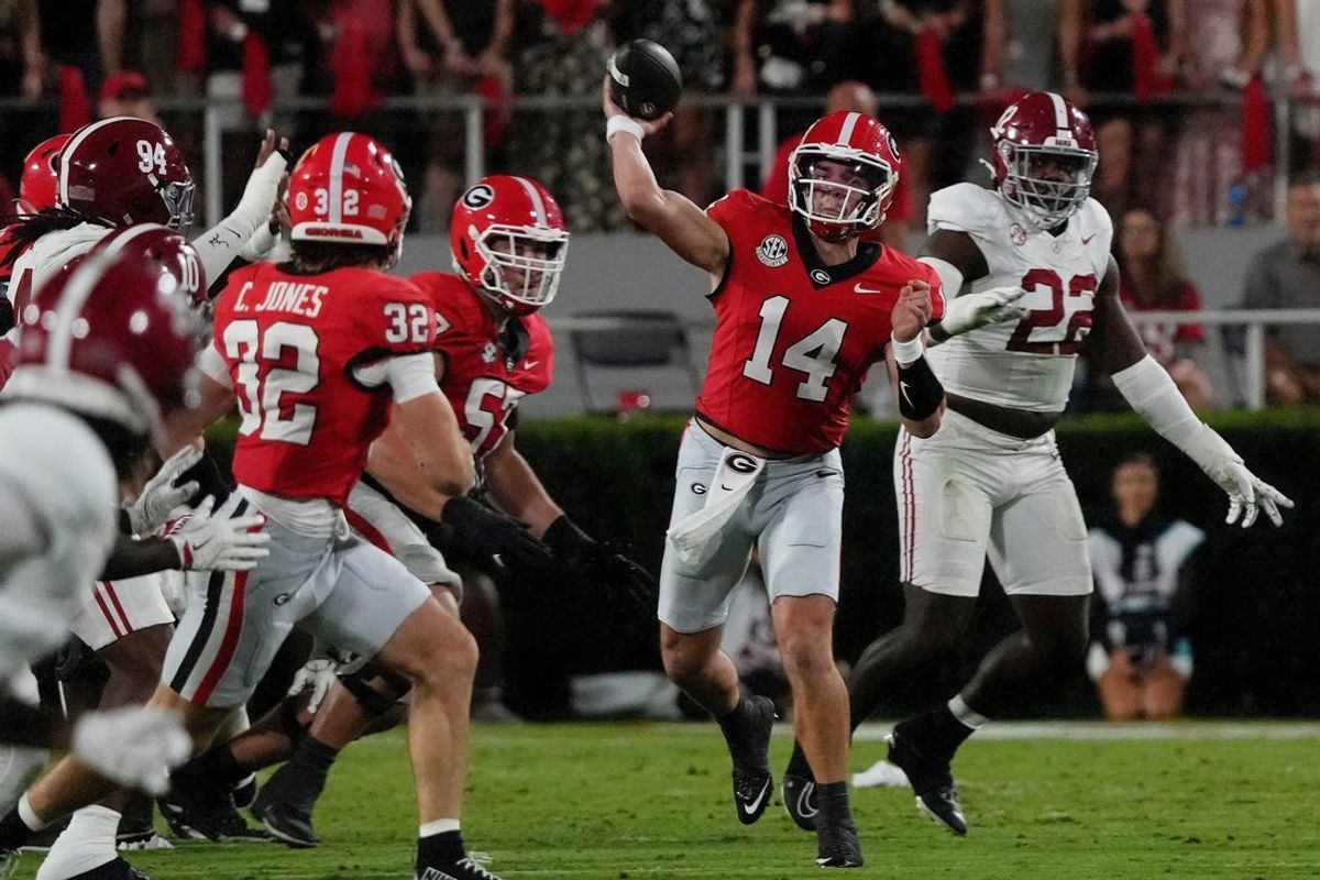 Georgia Bulldogs quarterback Gunner Stockton (14) throws the ball during the first half of a NCAA college football game against Alabama in Athens, Ga., on Saturday, September 27, 2025.