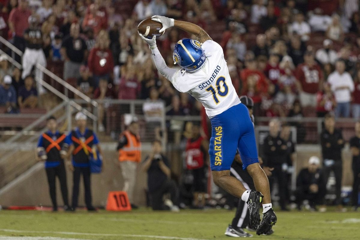Sep 27, 2025; Stanford, California, USA;  San Jose State Spartans wide receiver Danny Scudero (10) catches the ball for a touchdown during the fourth quarter against the Stanford Cardinal at Stanford Stadium. Mandatory Credit: Stan Szeto-Imagn Images