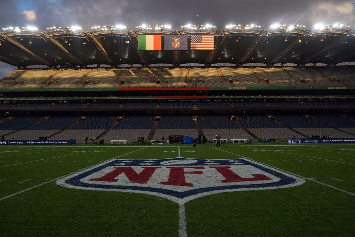 Sep 28, 2025; Dublin, Ireland; The Irish, NFL shield logo and United States flags and NFL shield logo at midfield at an NFL International Series game at Croke Park. Mandatory Credit: Kirby Lee-Imagn Images