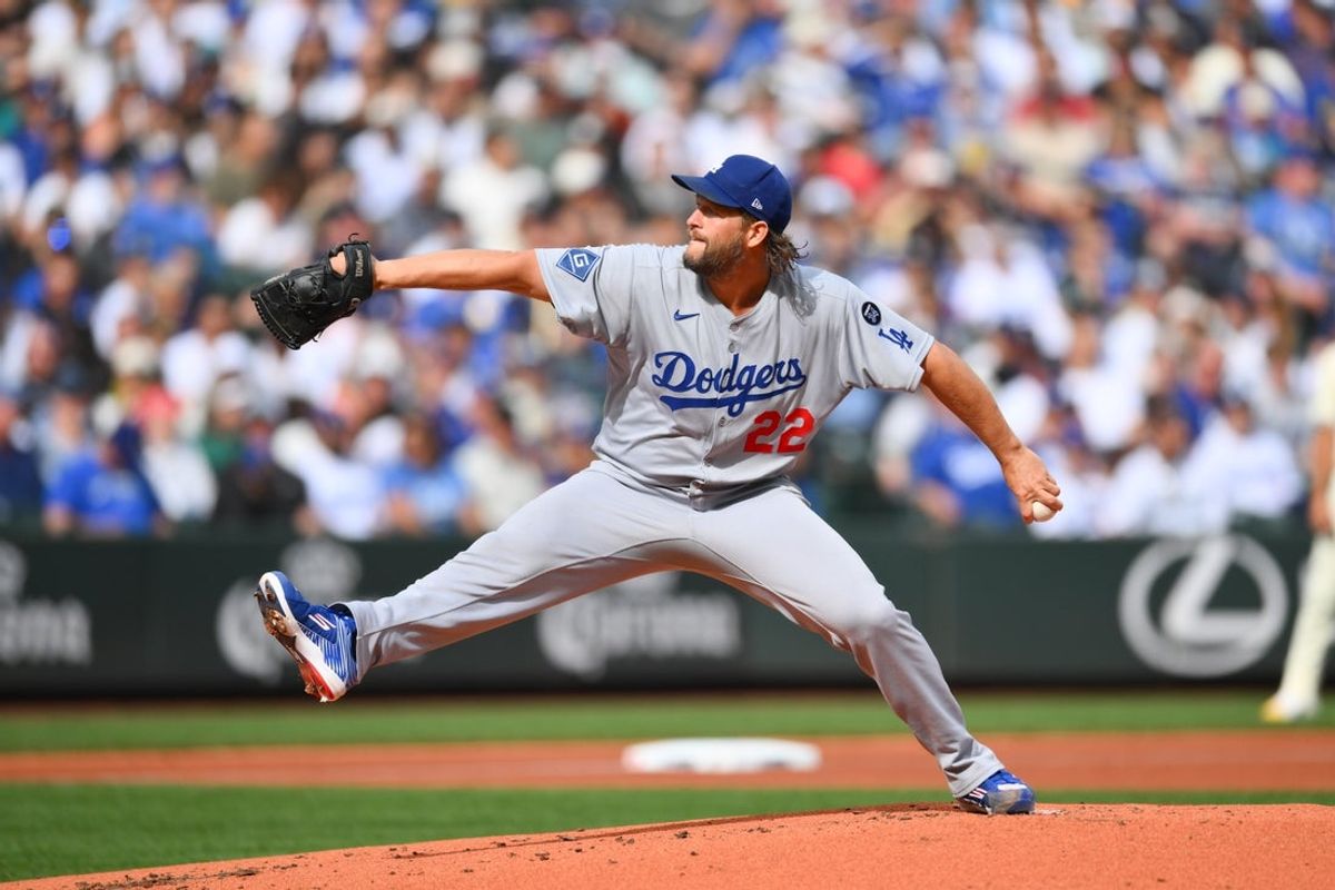 Sep 28, 2025; Seattle, Washington, USA; Los Angeles Dodgers starting pitcher Clayton Kershaw (22) pitches to the Seattle Mariners during the first inning at T-Mobile Park. Mandatory Credit: Steven Bisig-Imagn Images