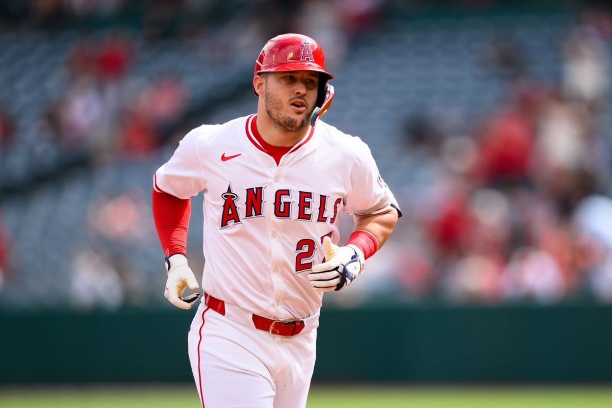 Sep 28, 2025; Anaheim, California, USA; Los Angeles Angels designated hitter Mike Trout (27) runs after hitting a home run during the first inning against the Houston Astros at Angel Stadium. Mandatory Credit: William Liang-Imagn Images