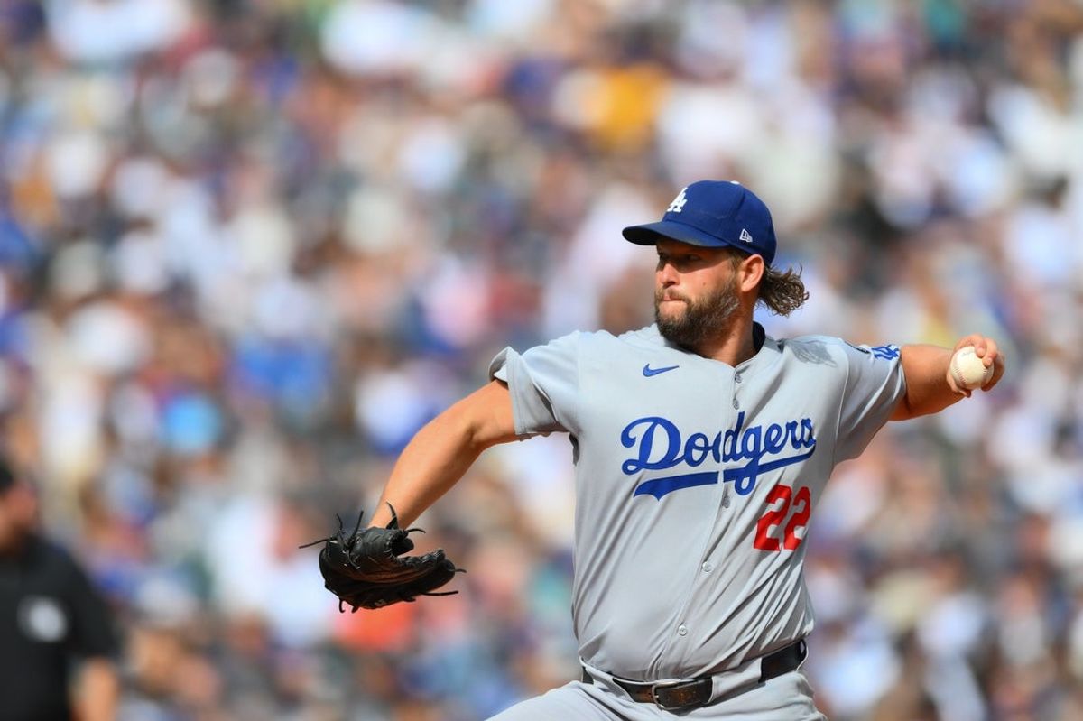 Sep 28, 2025; Seattle, Washington, USA; Los Angeles Dodgers starting pitcher Clayton Kershaw (22) pitches to the Seattle Mariners during the third inning at T-Mobile Park. Mandatory Credit: Steven Bisig-Imagn Images