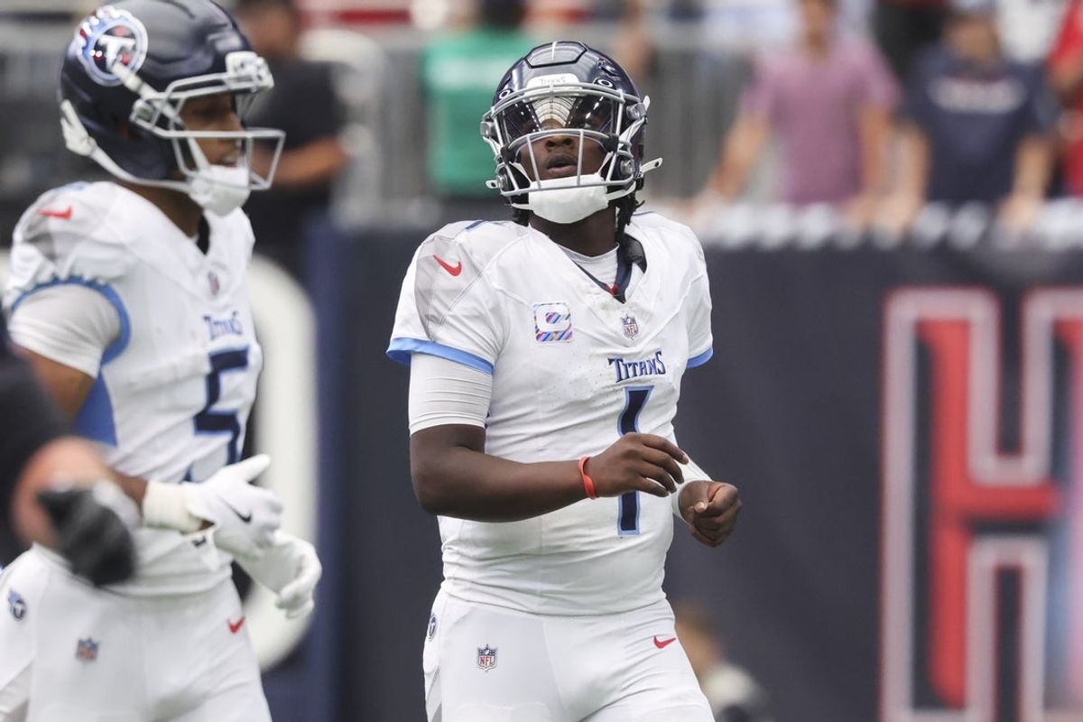 Sep 28, 2025; Houston, Texas, USA; Tennessee Titans quarterback Cam Ward (1) looks up while walking off the field during the fourth quarter against the Houston Texans at NRG Stadium. Mandatory Credit: Troy Taormina-Imagn Images