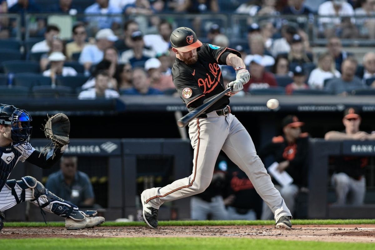 Sep 28, 2025; Bronx, New York, USA; Baltimore Orioles third baseman Jordan Westburg (11) hits a solo home run against the New York Yankees during the fourth inning at Yankee Stadium. Mandatory Credit: John Jones-Imagn Images