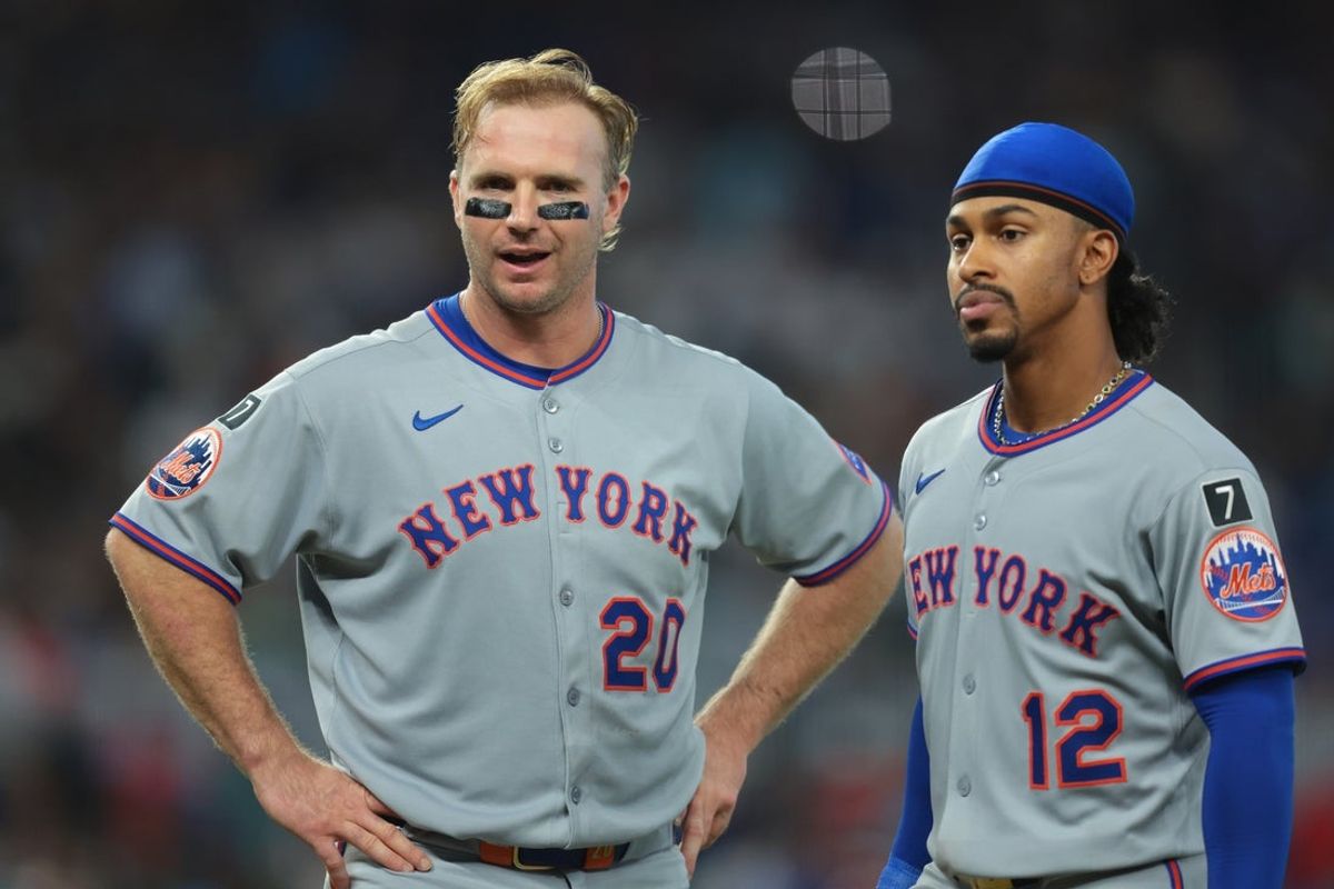 Sep 28, 2025; Miami, Florida, USA; New York Mets first baseman Pete Alonso (20) reacts while standing next to shortstop Francisco Lindor (12) after his at bat against the Miami Marlins during the fifth inning at loanDepot Park. Mandatory Credit: Sam Navarro-Imagn Images
