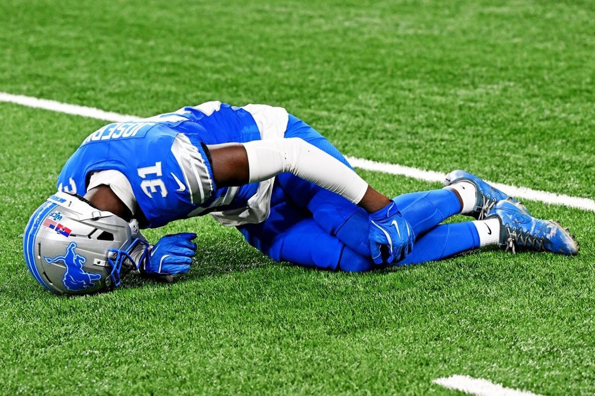 Sep 28, 2025; Detroit, Michigan, USA; Detroit Lions safety Kerby Joseph (31) holds his knee after an injury during the first half against the Cleveland Browns at Ford Field. Mandatory Credit: Lon Horwedel-Imagn Images