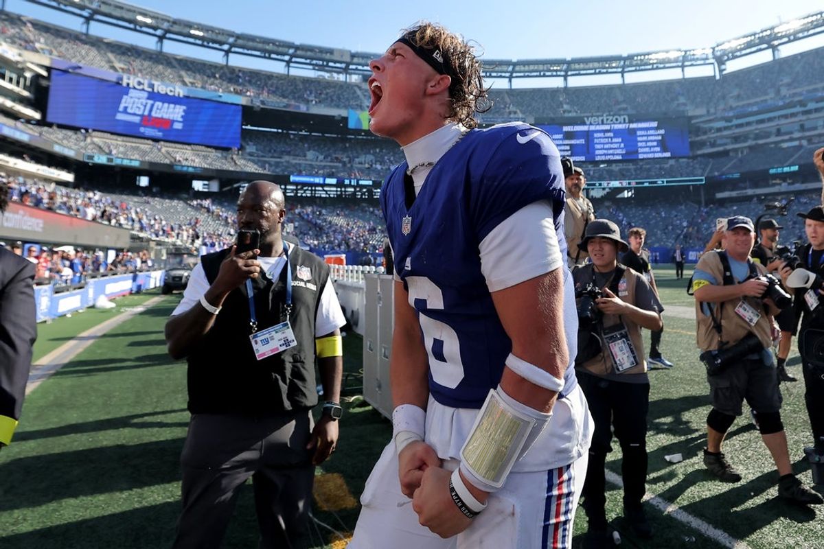 Sep 28, 2025; East Rutherford, New Jersey, USA; New York Giants quarterback Jaxson Dart (6) reacts after defeating the Los Angeles Chargers at MetLife Stadium. Mandatory Credit: Brad Penner-Imagn Images