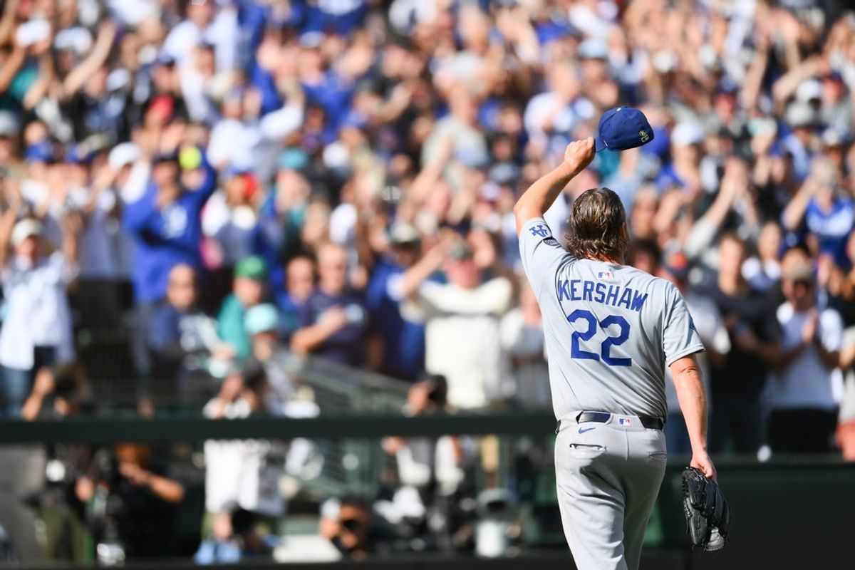 Sep 28, 2025; Seattle, Washington, USA; Los Angeles Dodgers starting pitcher Clayton Kershaw (22) waves to the crowd after being pulled from the game during the sixth inning against the Seattle Mariners at T-Mobile Park. Mandatory Credit: Steven Bisig-Imagn Images