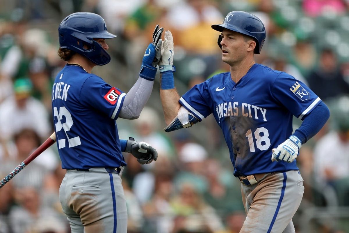 Sep 28, 2025; West Sacramento, California, USA; Kansas City Royals right fielder Mike Yastrzemski (13) is congratulated by catcher Carter Jensen (22) after hitting a solo home run against the Athletics during the seventh inning at Sutter Health Park. Mandatory Credit: Dennis Lee-Imagn Images