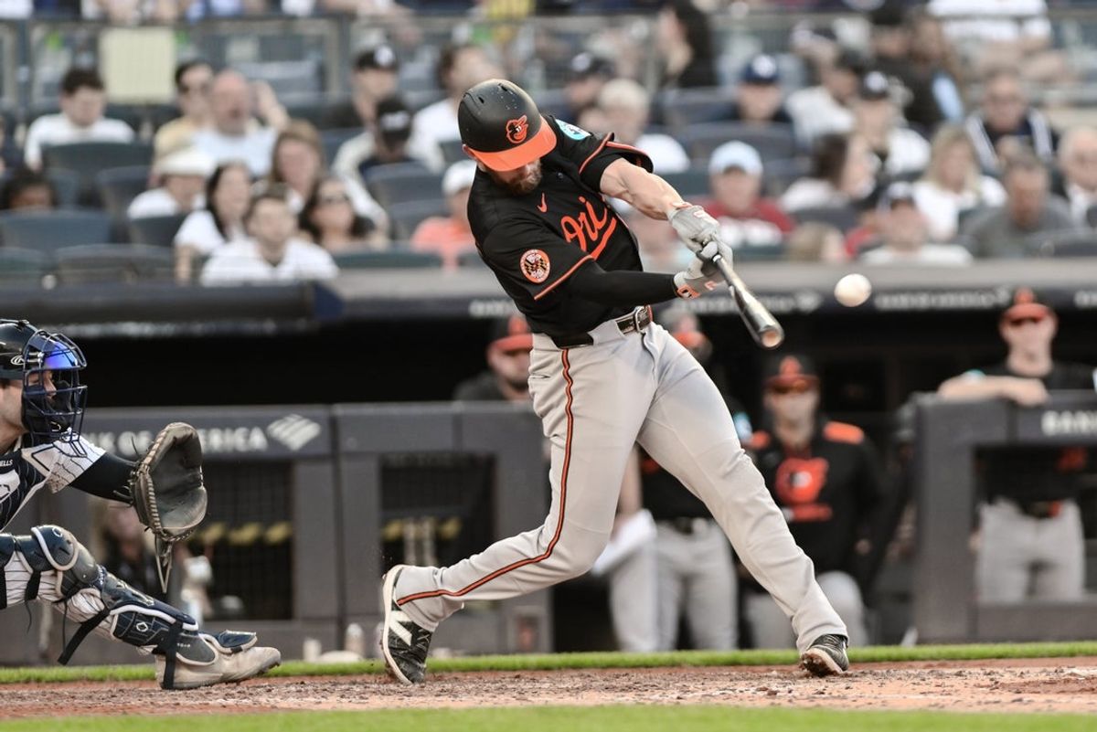 Sep 28, 2025; Bronx, New York, USA; Baltimore Orioles third baseman Jordan Westburg (11) hits a single against the New York Yankees during the sixth inning at Yankee Stadium. Mandatory Credit: John Jones-Imagn Images