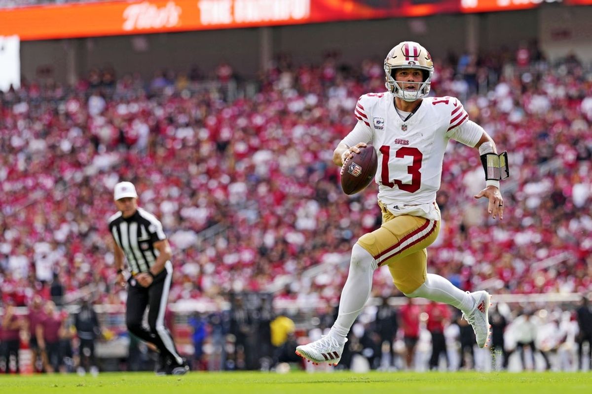 Sep 28, 2025; Santa Clara, California, USA; San Francisco 49ers quarterback Brock Purdy (13) runs the ball during the first half against the Jacksonville Jaguars at Levi's Stadium. Mandatory Credit: Kyle Terada-Imagn Images