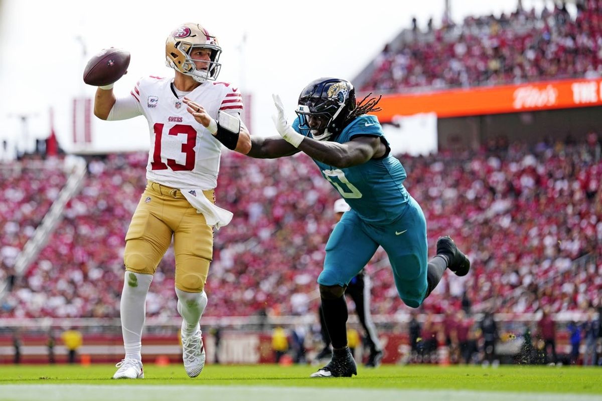 Sep 28, 2025; Santa Clara, California, USA; San Francisco 49ers quarterback Brock Purdy (13) passes the ball during the first half against the Jacksonville Jaguars at Levi's Stadium. Mandatory Credit: Kyle Terada-Imagn Images