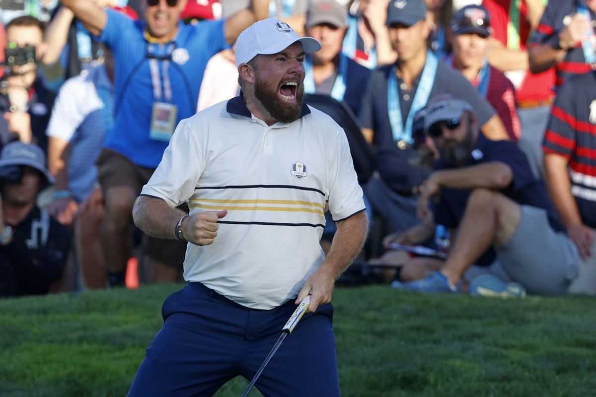 Sep 28, 2025; Bethpage, New York, USA; Team Europe golfer Team Europe golfer Shane Lowry reacts to his putt on the 18th hole on the final day of competition for the Ryder Cup at Bethpage Black. Mandatory Credit: Peter Casey-Imagn Images