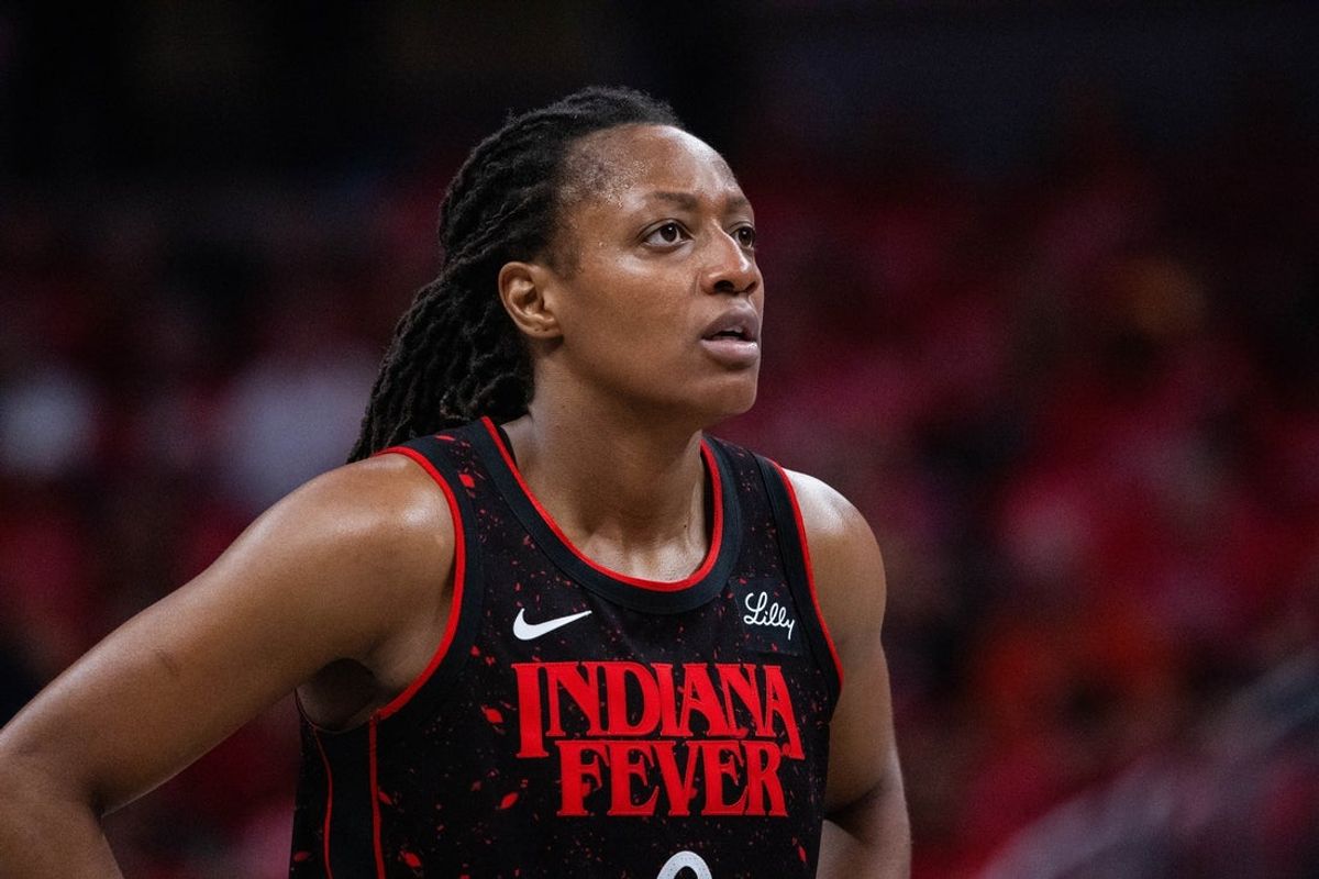 Sep 28, 2025; Indianapolis, Indiana, USA; Indiana Fever guard Kelsey Mitchell (0) in the second half during game four against the Las Vegas Aces of the second round for the 2025 WNBA Playoffs at Gainbridge Fieldhouse. Mandatory Credit: Trevor Ruszkowski-Imagn Images
