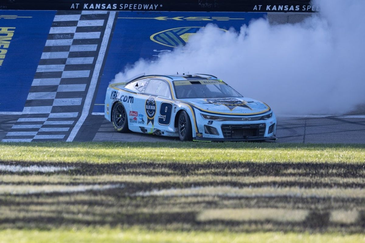Sep 28, 2025; Kansas City, Kansas, USA; Chase Elliott (9) celebrates his win at the NASCAR Cup Series Playoff Race at Kansas Speedway. Mandatory Credit: Kylie Graham-Imagn Images