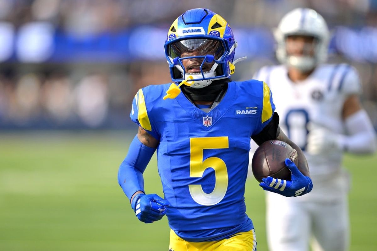 Sep 28, 2025; Inglewood, California, USA; Los Angeles Rams wide receiver Tutu Atwell (5) runs for a touchdown on an 88 yard pass play in the fourth quarter against the Indianapolis Colts at SoFi Stadium. Mandatory Credit: Jayne Kamin-Oncea-Imagn Images