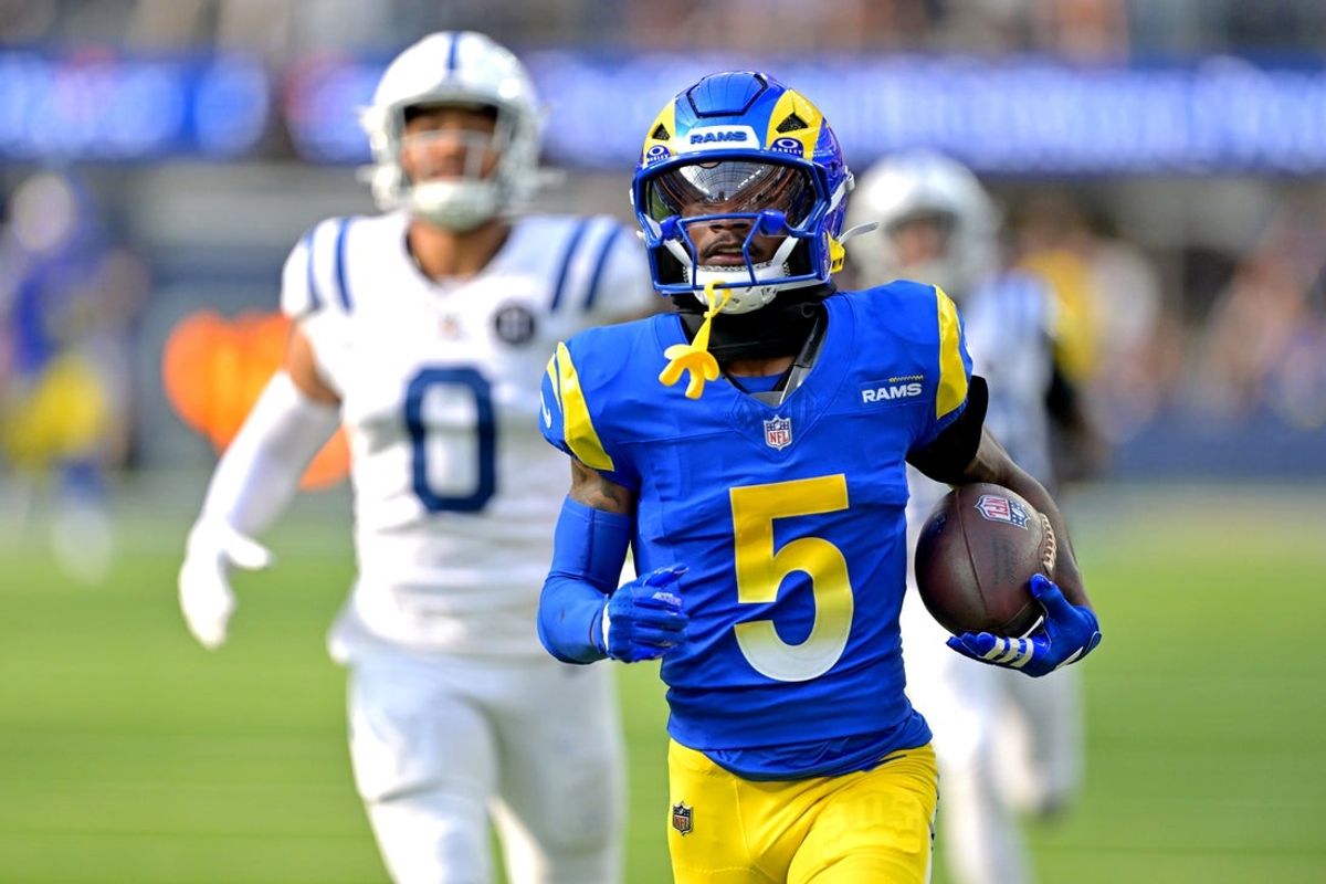 Sep 28, 2025; Inglewood, California, USA; Los Angeles Rams wide receiver Tutu Atwell (5) runs for a touchdown on an 88 yard pass play in the fourth quarter against the Indianapolis Colts at SoFi Stadium. Mandatory Credit: Jayne Kamin-Oncea-Imagn Images