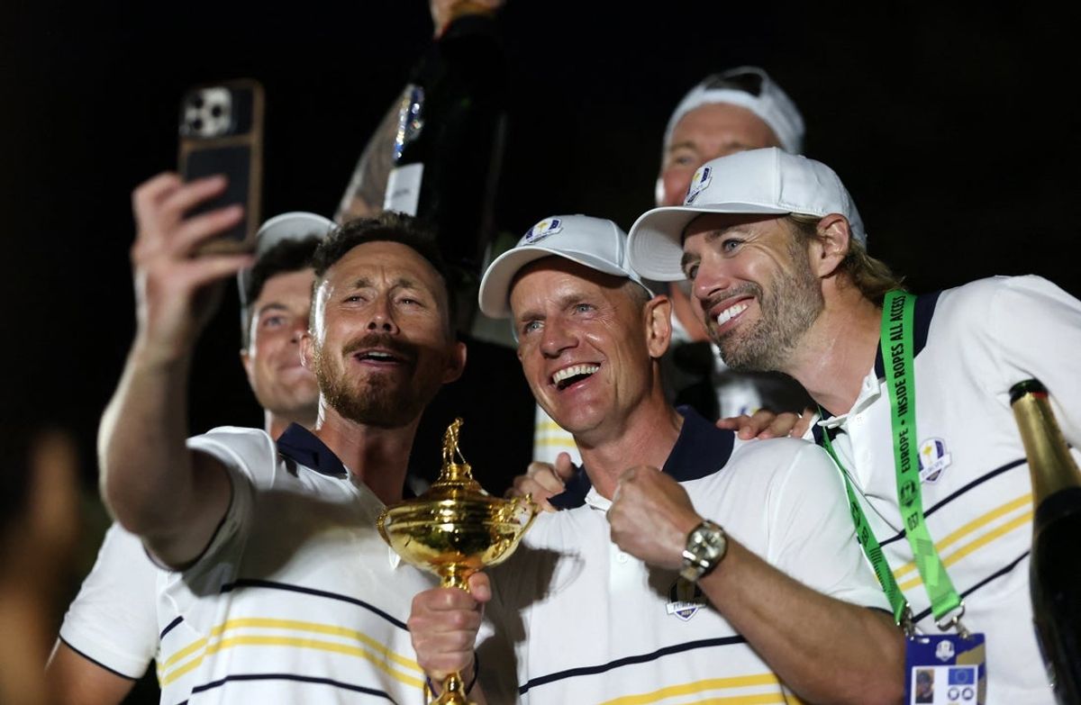 [US, Mexico & Canada customers only] Sep 28, 2025; Bethpage, New York, USA; Team Europe captain Luke Donald celebrates with the trophy after winning the Ryder Cup on the final day of competition for the Ryder Cup at Bethpage Black. Mandatory Credit: Brendan Mcdermid-Reuters via Imagn Images