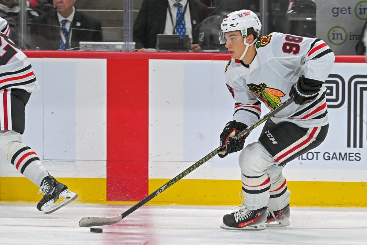 Sep 28, 2025; Saint Paul, Minnesota, USA;  Chicago Blackhawks forward Connor Bedard (98) controls the puck against the Minnesota Wild during the third period at Xcel Energy Center. Mandatory Credit: Nick Wosika-Imagn Images