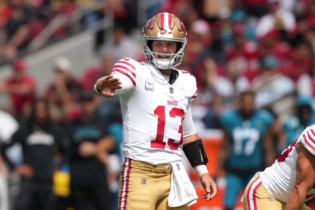 Sep 28, 2025; Santa Clara, California, USA; San Francisco 49ers quarterback Brock Purdy (13) gestures during the first quarter against the Jacksonville Jaguars at Levi's Stadium. Mandatory Credit: Darren Yamashita-Imagn Images