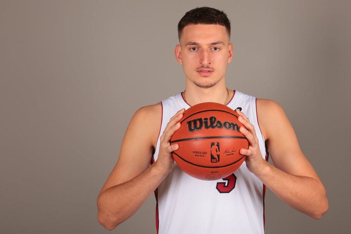 Sep 29, 2025; Miami, FL, USA; Miami Heat forward Nikola Jovic (5) poses for a photo during media day at Kaseya Center. Mandatory Credit: Sam Navarro-Imagn Images