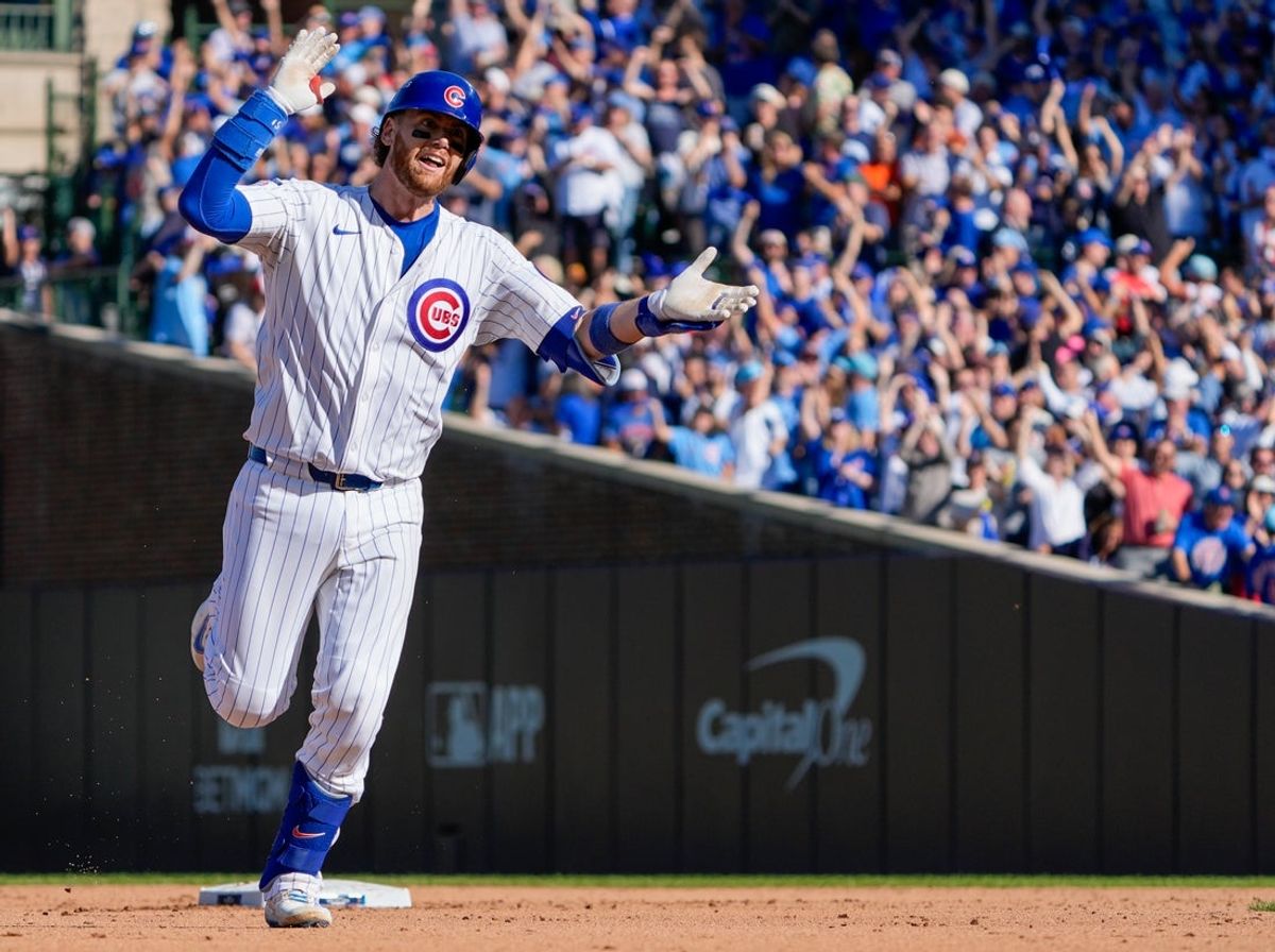 Sep 30, 2025; Chicago, Illinois, USA; Chicago Cubs catcher Carson Kelly (15) rounds the bases after hitting a solo home run in the fifth inning against the San Diego Padres during game one of the Wildcard round for the 2025 MLB playoffs at Wrigley Field. Mandatory Credit: David Banks-Imagn Images