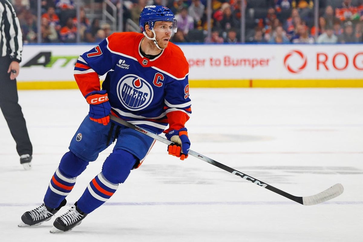 Sep 28, 2025; Edmonton, Alberta, CAN; Edmonton Oilers forward Connor McDavid (97) follows the play against the Vancouver Canucks at Rogers Place. Mandatory Credit: Perry Nelson-Imagn Images