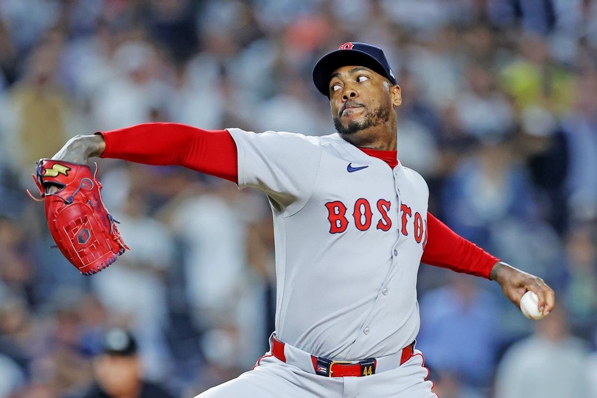 Sep 30, 2025; Bronx, New York, USA; Boston Red Sox pitcher Aroldis Chapman (44) relief pitcher throws a pitch during the eighth inning against the New York Yankees during game one of the Wildcard round for the 2025 MLB playoffs at Yankee Stadium. Mandatory Credit: Brad Penner-Imagn Images