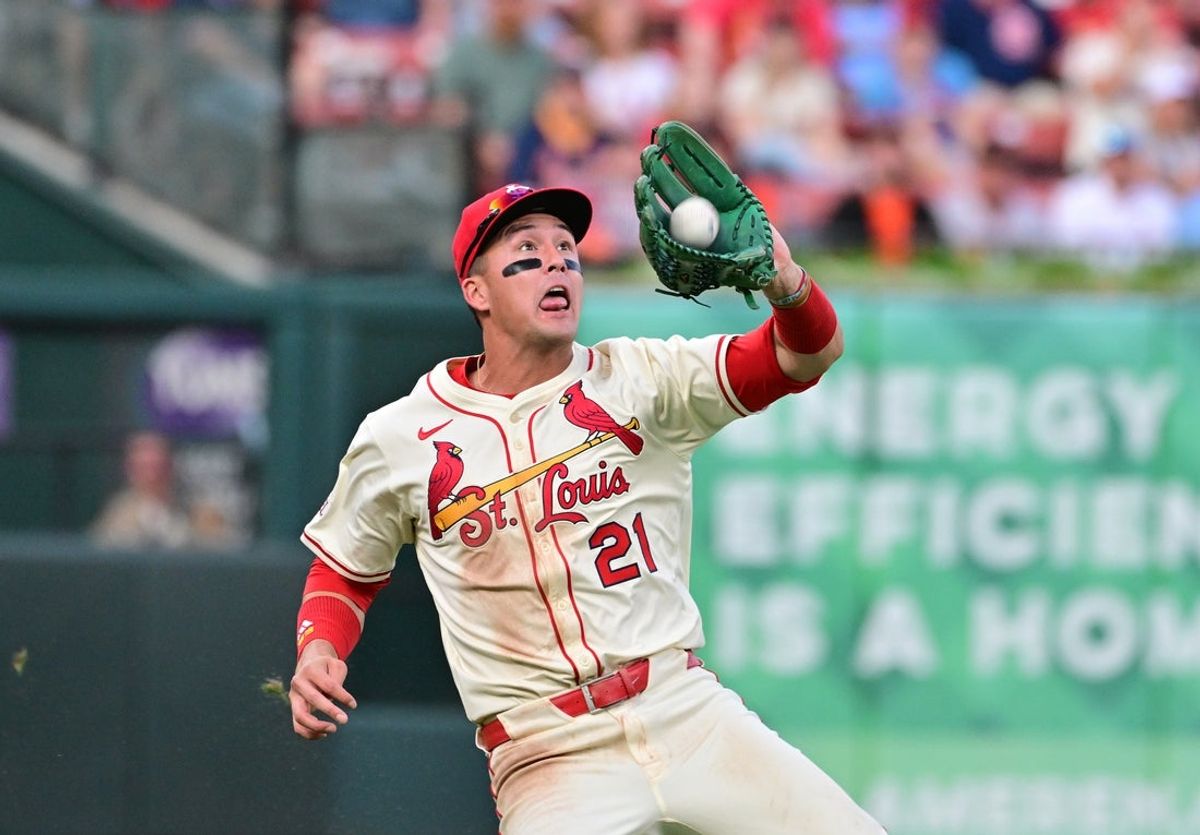 Sep 6, 2025; St. Louis, Missouri, USA; St. Louis Cardinals outfielder Lars Nootbaar (21) makes the catch on a fly ball to left field by San Francisco Giants catcher Patrick Bailey (14) in the second inning at Busch Stadium. Mandatory Credit: Tim Vizer-Imagn Images