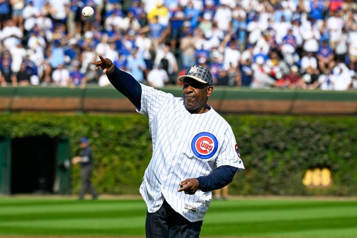 Oct 1, 2025; Chicago, Illinois, USA; Former Chicago Cubs player Andre Dawson throws out the ceremonial first pitch prior to the game against the San Diego Padres during game two of the Wildcard round for the 2025 MLB playoffs at Wrigley Field. Mandatory Credit: Matt Marton-Imagn Images