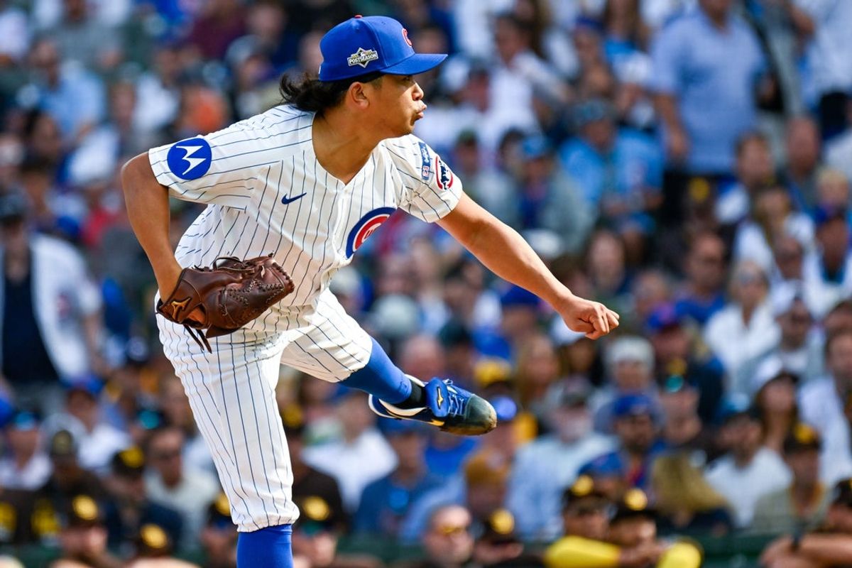 Oct 1, 2025; Chicago, Illinois, USA; Chicago Cubs relief pitcher Shota Imanaga (18) delivers a pitch against the San Diego Padres in the second inning in the during game two of the Wildcard round for the 2025 MLB playoffs at Wrigley Field. Mandatory Credit: Matt Marton-Imagn Images