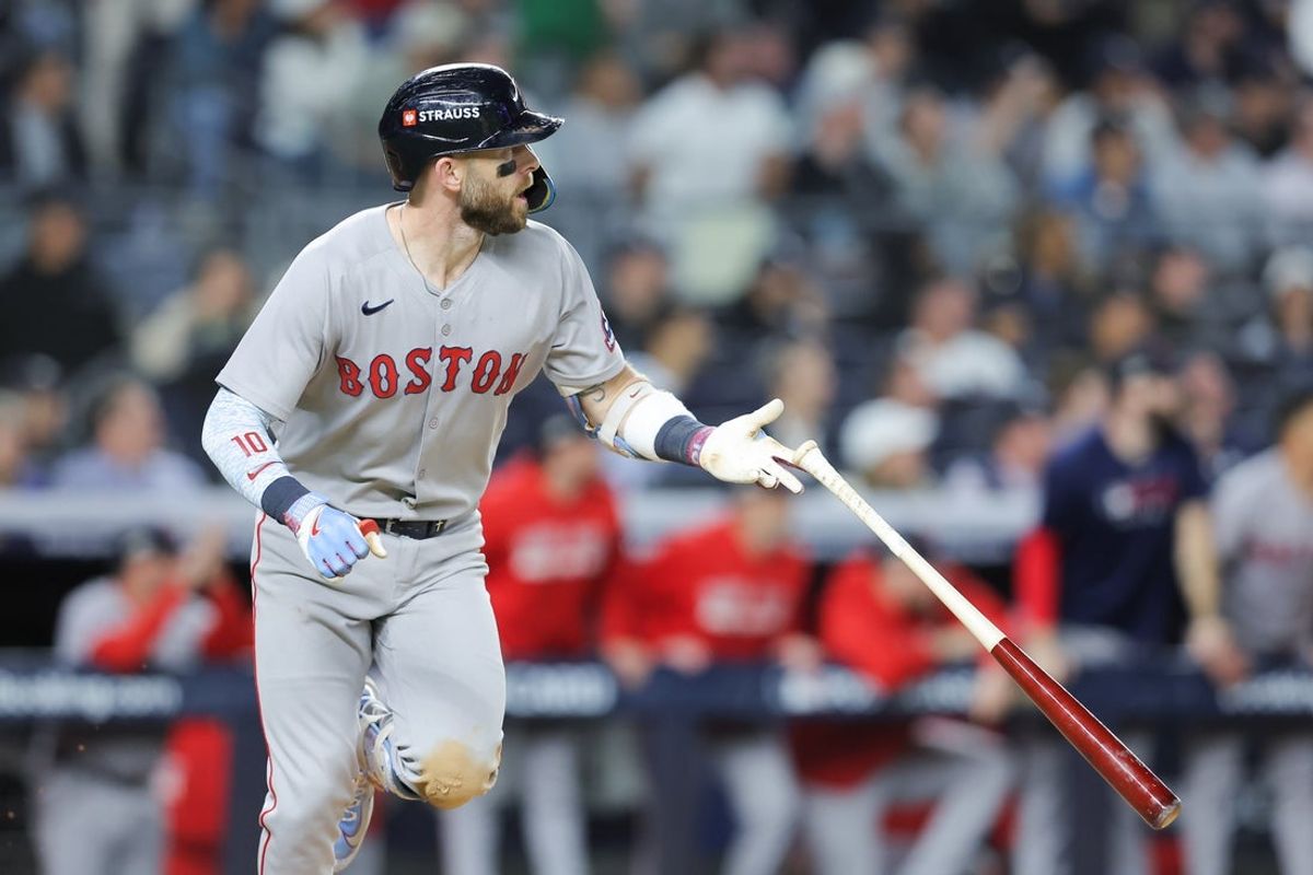 Oct 1, 2025; Bronx, New York, USA; Boston Red Sox shortstop Trevor Story (10) hits a one run home run during the sixth inning against the New York Yankees during game two of the Wildcard round for the 2025 MLB playoffs at Yankee Stadium. Mandatory Credit: Brad Penner-Imagn Images