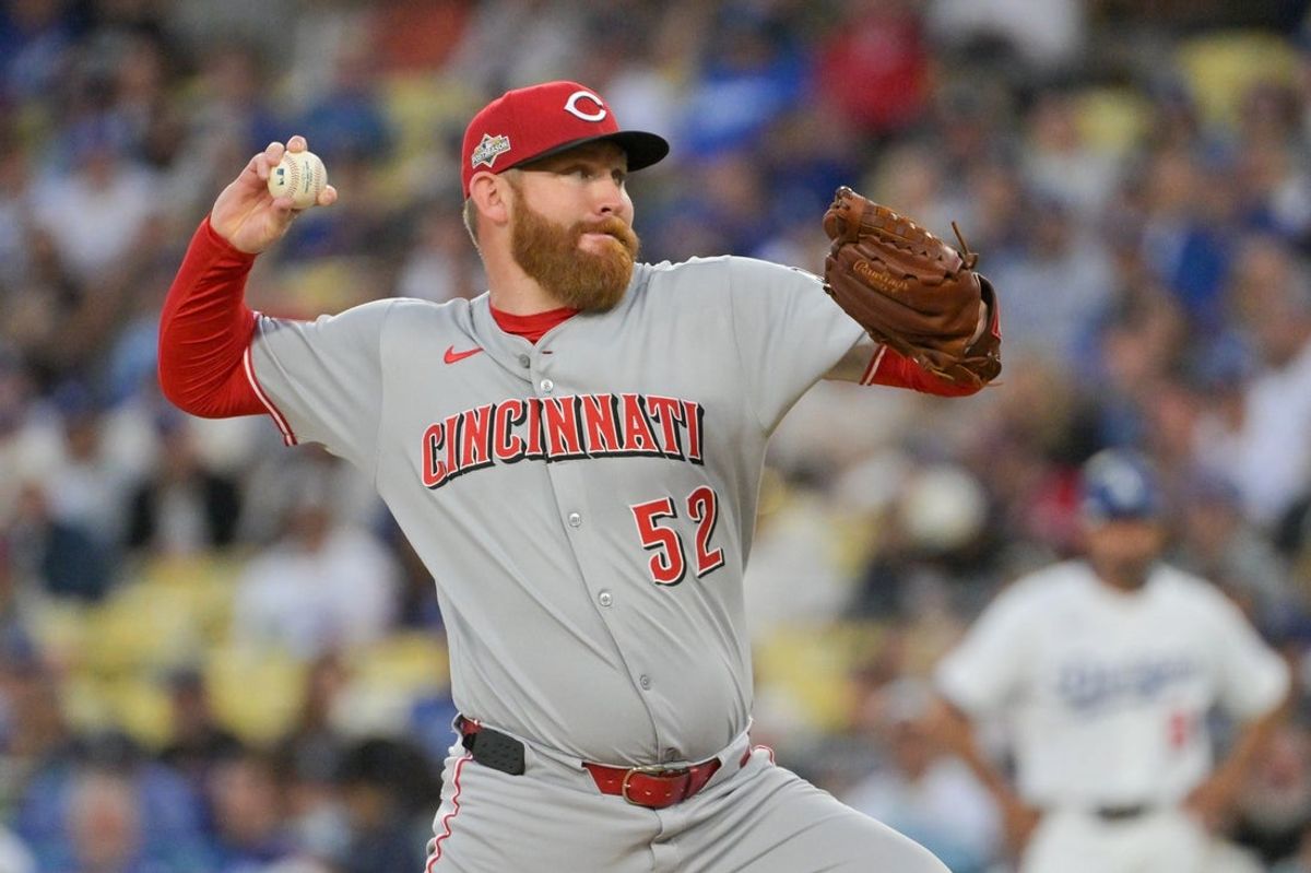 Oct 1, 2025; Los Angeles, California, USA; Cincinnati Reds starting pitcher Zack Littell (52) throws a pitch against the Los Angeles Dodgers in the first inning during game two of the Wildcard round for the 2025 MLB playoffs at Dodger Stadium. Mandatory Credit: Jayne Kamin-Oncea-Imagn Images