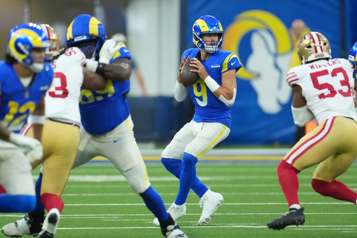 Oct 2, 2025; Inglewood, California, USA; Los Angeles Rams quarterback Matthew Stafford (9) drops back to pass against the San Francisco 49ers during the first half at SoFi Stadium. Mandatory Credit: Kirby Lee-Imagn Images